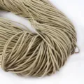 Macro dettaglio del cordino elastico rotondo dorato da 2 mm per coulisse da abbigliamento. - 2m/Fascio-2mm / Kaki