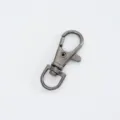 Close-up detail of a gunmetal alloy swivel snap hook lobster clasp for bags and keys - Gunmetal