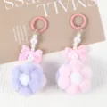 Close-up of handmade pink and purple plush flower pendants with pearl beads - 1 Piece / Pink + Purple