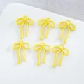 Breloques pendentif ruban nœud en alliage jaune DIY bracelet collier fabrication accessoires - 10 Pièces/Paquet / Jaune