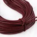 Macro view of 3mm burgundy PU leather cord with exquisite stitching for DIY handbag decor - Approx 2 Meters/Bundle (3mm) / Burgundy