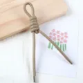 Detailed view of 5mm pearlescent PU leather cord with metal tips, ideal for DIY bag and phone charms. - 1 Piece / Khaki