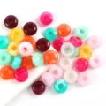 Close-up shot of colorful 14mm acrylic donut beads, perfect for diy jewelry and phone chains. - 10 Pieces/Pack / Multicolor (03)