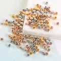 Detailed view of metallic square CCB spacer beads, shiny electroplated finish for DIY jewelry. - Multicolor