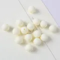 Close-up macro view of matte frosted white acrylic round beads for DIY jewelry making. - 14mm 20 Pieces/Pack / 01 Beige