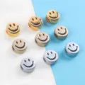 Close-up of metallic smiley face acrylic beads in gold and silver for DIY jewelry making. - 20 Pieces Set / Mixed Metallic Colors (06)