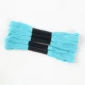 Detailed view of four bundles of bright blue 6-strand polyester embroidery floss - 5 Pcs Set / Blue