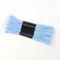 Close-up of light blue 6-strand polyester embroidery thread skeins for cross-stitch. - 5 Pcs Set / Sky Blue
