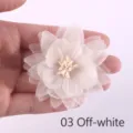 Close-up of a delicate off-white chiffon and organza handmade fabric flower accessory. - Beige (03)