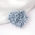 Close-up detail of blue gradient acrylic beads with AB iridescent finish in heart box. - 6mm Size / Color 03 Style
