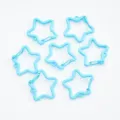 Macro detail of light blue star-shaped spring lobster clasps for DIY jewelry making - Blue