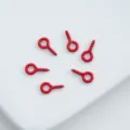Detail shot of red painted screw eye hooks for DIY phone case pendants and jewelry accessories. - 8mm (100pcs) / Red