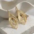Elegant vintage gold multi-layer hollow leaf earrings with fine texture for women - Hollow Multi-layer Leaf Style (E6009-1)