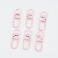 Dettaglio dei moschettoni in lega di zinco rosa chiaro con finitura laccata - 5 Pezzi/Confezione / Rosa chiaro