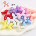Macro detail of colorful resin balloon dog beads for DIY keychain jewelry making - Large Balloon Dog