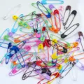 Detailed view of colorful safety pins, alloy baking paint finish, perfect for DIY jewelry. - 31mm (50 Pcs) / Mixed Colors