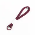 Close-up view of maroon hand-woven phone lanyard with white cord wrap and ring clip - Wine Red/White