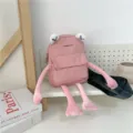 Cute pink cartoon frog crossbody bag for girls featuring long limbs and iconic X eye design - Pink