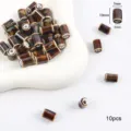 Set de 10 cuentas cilíndricas de cerámica marrón de 10x7mm para hacer joyas artesanales - Cilindro