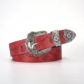 Close-up of vintage red leather belt with detailed floral engraving and silver buckle - 110 / Red
