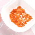 Vibrant orange silver-lined glass bugle beads for DIY jewelry and clothing craft. - 20g/Pack / Orange