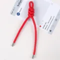 Rote geflochtene Leder Knoten Tasche Anhänger und Schlüsselanhänger Variante in rot. - Leuchtend Rot