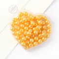 Golden ABS imitation pearl beads, round straight-hole loose beads for DIY jewelry making accessories. - 10mm (Approx. 50 Pieces) / Light Orange