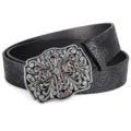 Detailed view of retro embossed belt with ornate cross buckle design - 110 / Black