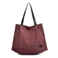 Large capacity burgundy canvas tote bag for women featuring stylish black shoulder straps - Burgundy