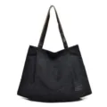 Large capacity black canvas tote bag for women with stylish and sturdy shoulder straps - Black