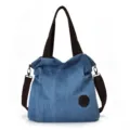 Sac fourre-tout décontracté en toile bleue pour femme avec anses et bandoulière marron. - Bleu