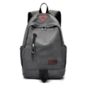 Classic vintage gray canvas backpack for men featuring stylish brown leather accents - Gray