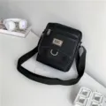 Classic black Oxford cloth messenger bag for men with adjustable shoulder strap - L / Black