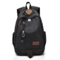 Classic vintage black canvas backpack for men featuring durable brown leather accents - Black