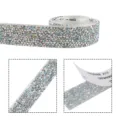 Close-up detail of shiny resin rhinestone tape with adhesive backing for DIY crafts. - 10mm / White AB