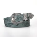 Retro carved buckle teal leather belt with embossed leaf and clover floral patterns. - Dark Green