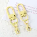 Yellow painted U-shape swivel snap hook and lobster clasp DIY keychain hardware detail shot. - 07# Light Yellow