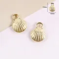 Détail du pendentif coquillage doré, idéal pour la fabrication de bijoux DIY et boucles d'oreilles. - Coquillage Doré (50 pcs/paquet)