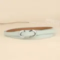 Close-up of a thin mint green women's waist belt with a silver double-ring buckle - 110cm / Mint Green