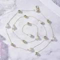 Elegante catena in oro per la vita con perle bianche finte e perline di metallo - Catena Dorata Perla