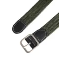 Close-up detail of the green braided elastic belt showing the metal buckle and leather ends. - Square Buckle / 105cm / Green
