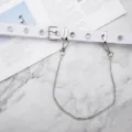 Cinturón de lona blanca estilo punk para mujer con ojales y cadena de plata móvil - Blanco / 105cm