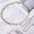 Elegant gold metal waist chain with rhinestone flower inlay for dresses and coats - Flower Rhinestone Style / Gold