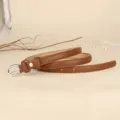 Elegant minimalist slim brown leather belt for women featuring a polished silver buckle - 110cm / Caramel color