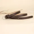 Slim brown leather belt for women with an elegant silver buckle and soft leather texture. - 110cm / Dark Brown