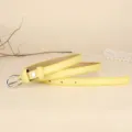 Minimalist thin yellow leather belt for women featuring a sleek silver metal buckle - 110cm / Lemon Yellow