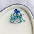 Broche de pulpo creativo de la serie océano con brillantes diamantes de imitación azules - Azul