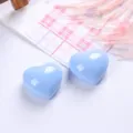 Close-up of two light blue heart-shaped resin charms for DIY craft accessories. - Heart Shape (MG-2344) / 1 Piece / Sky Blue