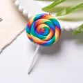 Close-up detail of a colorful rainbow polymer clay lollipop charm with silver ring - With Eye Pin Hook / Rainbow Style 1