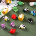 Detailed macro view of colorful miniature resin animal charms for DIY craft projects - Mixed